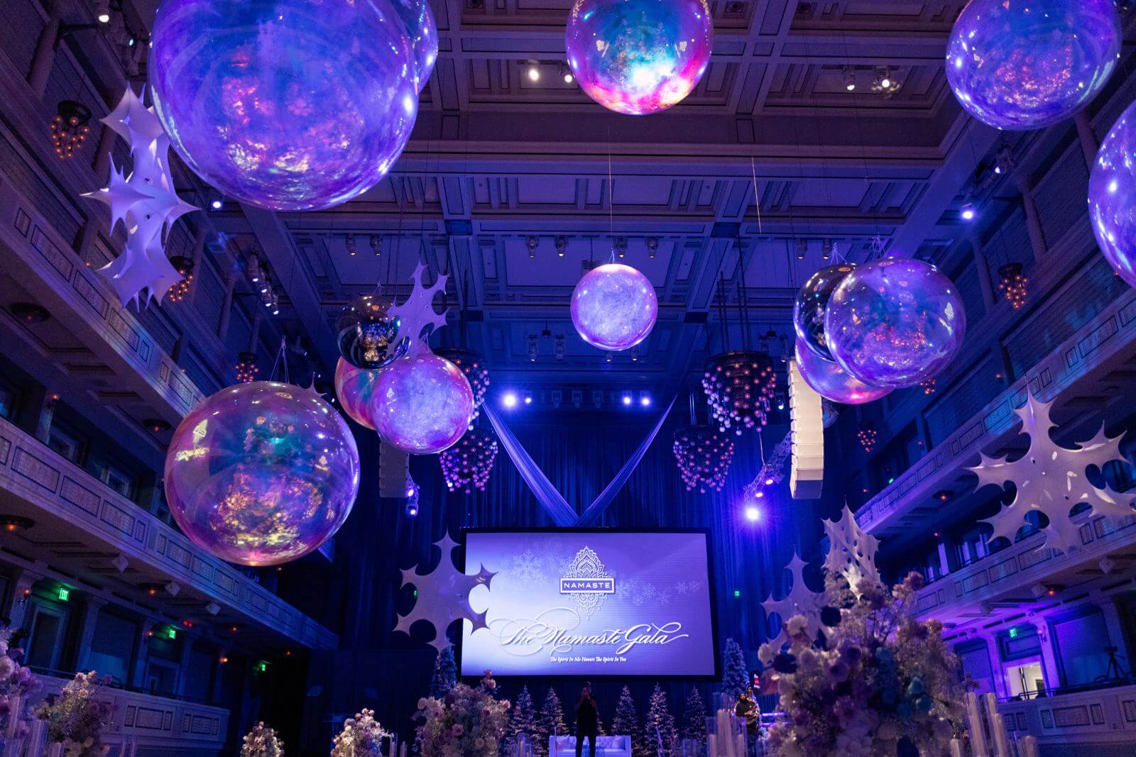 The transformed ballroom with mirrored spheres and winter staging