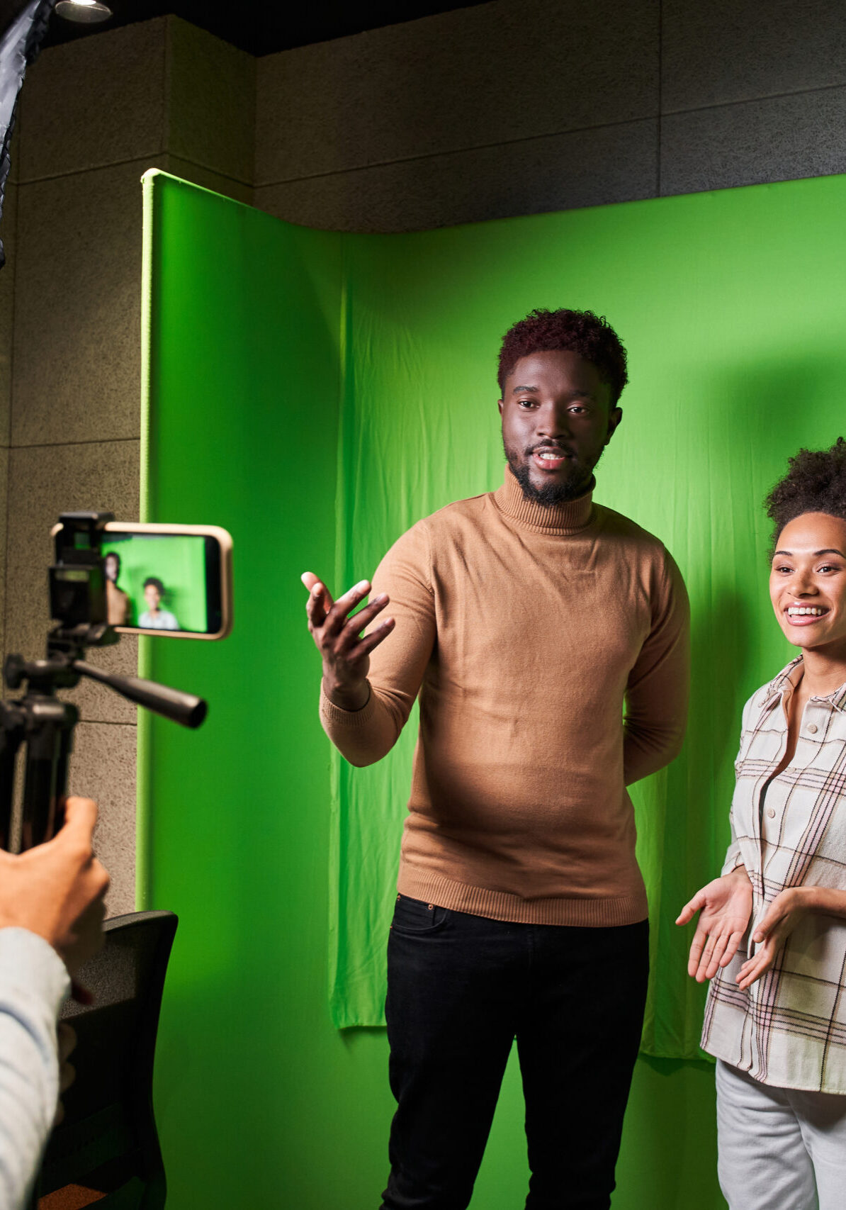 Live broadcast with professional male and female blogger reporting on the events of the day. Television concept. Chroma key template background